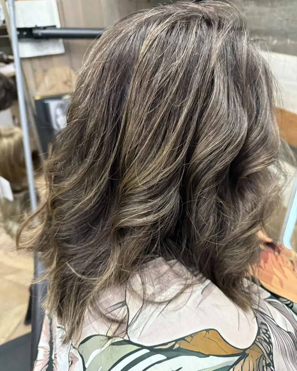 Ash brunette balayage with movement, back view