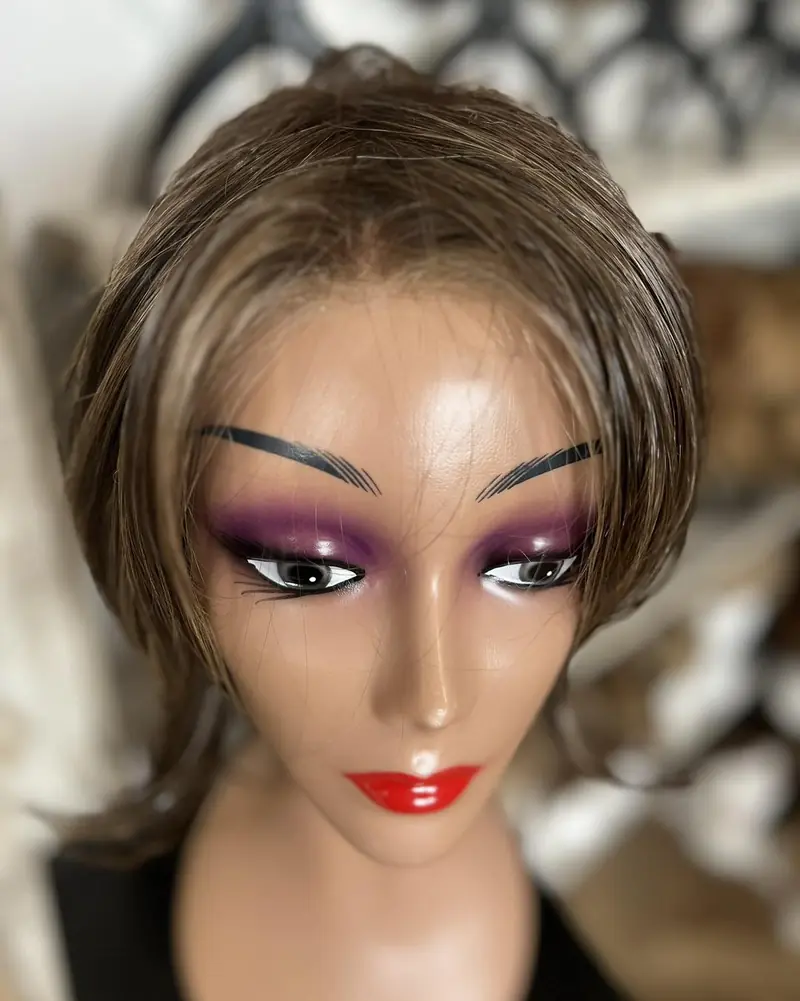 Dark wig on a mannequin head